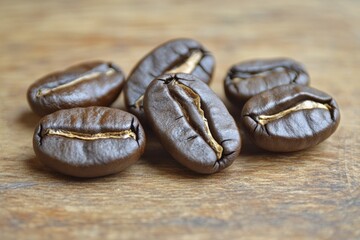 Aufkleber - Coffee beans arranged on a wooden surface showcasing their rich color and texture