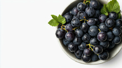 Poster - Fresh grapes and mint salad in a ceramic bowl on white background for healthy summer cuisine
