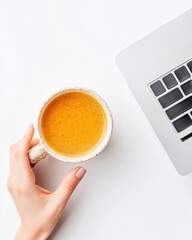 Poster - Minimalist Productivity Essentials Warm Golden Turmeric Wellness Brew Alongside Modern Laptop - Remote Work Inspiration for Digital Professionals