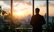© Endin - Businessman silhouette watching sunrise city view