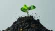 © YOUR - Green sprout emerging from soil against a light gray background