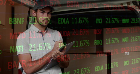 Poster - Image of financial data processing over delivery man writing on clipboard outside of warehouse