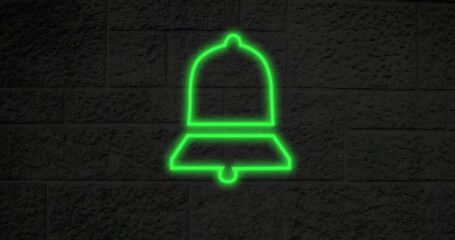 Poster - Glowing green neon bell sign on textured brick wall, symbolizing notifications