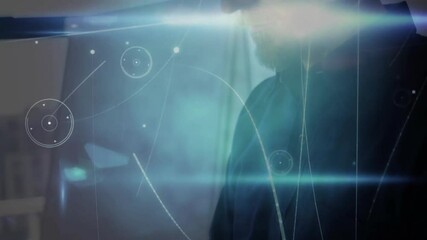 Poster - in dim light, man with digital lines and glowing animation effects overlaying