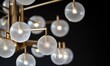 © TheoTheWizard - A large chandelier with many small glass globes hanging from it