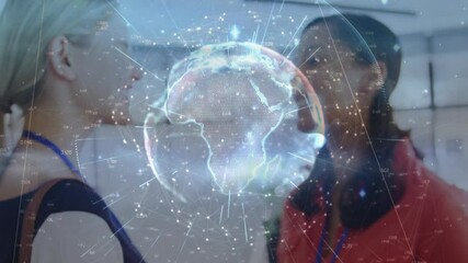Poster - Digital globe animation over two people discussing in modern office setting