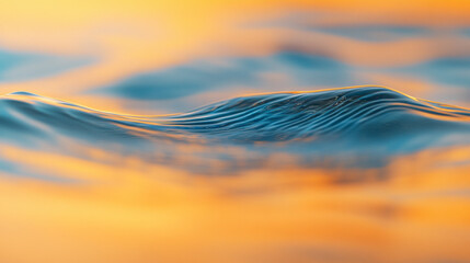 Poster - A close up view of a small wave with an orange and blue background creating a dreamy effect