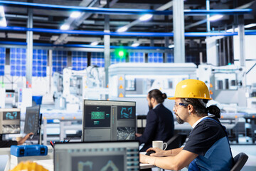 Poster - photovoltaics factory employee programming solar manufacturing machinery using pc, finetuning system