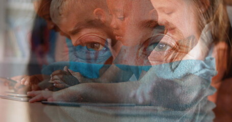 Poster - In school, woman wearing mask observing children playing with tablets in classroom