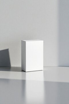 Plain packaging box mockup next to a simple product (no label)