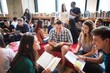 © Rawpixel.com - Diverse group of students study in library, read books, group discussion. Diverse group of students collaborative in school library. Diverse college students focus on books in groups in library