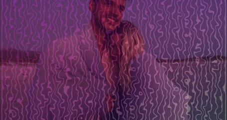 Poster - Embracing couple with animation of abstract purple wavy pattern overlaying scene
