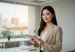 © AlfaSmart - Professional businesswoman holding tablet in modern office setting for corporate and technology theme