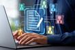 © tadamichi - Document collaboration and file sharing. Team work and collaborative editing in document management solutions. Businessman using laptop computer for document synchronization.