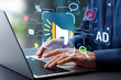 © tadamichi - Digital marketing strategy. Announce promotions and campaigns via email and social media. Marketer using laptop computer to manage targeted advertising.