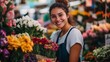 © IMAGINIAC - Smiling Woman Surrounded by Colorful Flower Display at a Floral Market Indoors