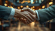 © Prokopchuk - Business Handshake Sealing a Successful Deal