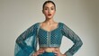 © Saad - Indian lehenga choli fashion model in teal outfit posing for a lifestyle portrait shot