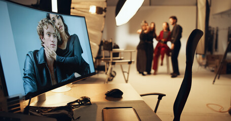 Poster - Post production, screen and picture in studio, creative and editing of image of couple, monitor and online. People, process and display of photo for media company, digital and retouching for magazine
