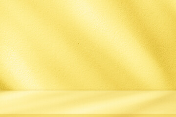Fototapete - Yellow background with light and shadow of leaf effect on studio concrete wall texture for Autumn banner,Backdrop empty kitchen cement wall room with blur natural sunlight on for floor product design