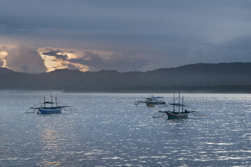 traditional fishermen boats at the coast of tropical morotai island in north maluku province during 