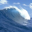 © V_Design_Creator - Powerful Ocean Wave Curling Under Bright Blue Sky