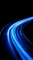 Wall Mural - a long-exposure photograph of blue and white light trails on a black background