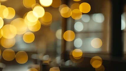 Wall Mural - Golden Bokeh Lights Over Restaurant Interior Creating Warm And Festive Atmosphere