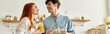 © LIGHTFIELD STUDIOS - Young couple enjoying quality time together at home with drinks and laughter