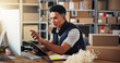 © peopleimages.com - Computer, information and logistics with man in warehouse office for schedule or update. Boxes, pointing and tablet with employee in supply chain depot for delivery, ecommerce or shipping manifest
