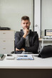 © NINENII - Smiling confident mature businessman leader looking at camera in office.