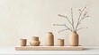 © A B I G A I L - Earthenware vessels and flowering branch on minimalist shelf