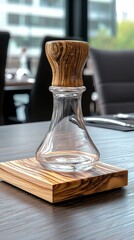 Poster - Elegant glass bottle sitting gracefully on a rustic wooden table in soft natural lighting