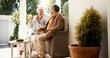 © CC/peopleimages.com - Bonding, talking and senior couple with coffee, home and elderly people with beverage for chat and morning. Happy, old man and mature woman with tea on patio, comfortable and family with cookies
