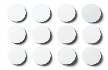 Poster - A clean grid of twelve white circular stickers casting shadows on a bright white surface overhead shot