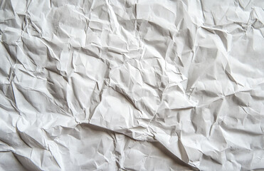 Aufkleber - A close up view of a sheet of white paper that has been crumpled and then smoothed out flatly