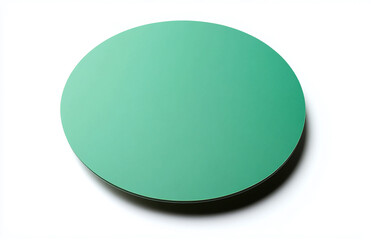 Poster - A top view of a circular, flat, mint green object with a dark edge on a white surface background