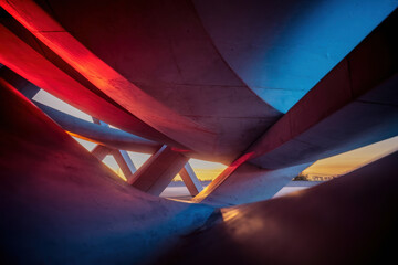 Poster - Futuristic Urban Architecture Bathed in Sunset Hues with Dramatic Light Play
