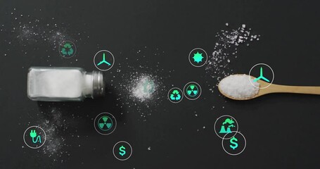 Poster - Environmental icons with salt shaker and spoon on black background in animation