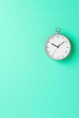 Poster - wall clock positioned on clean solid color background symbolizing simplicity of time adjustment
