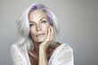 © Moriarty - A confident and elegant woman with white hair and violet highlights, reflecting empowerment, mature fashion, and timeless beauty. Her radiant expression and modern style are ideal for fashion, wellnes