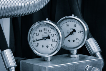 Aufkleber - Two pressure gauges are on a metal box. The gauges are white and have black numbers