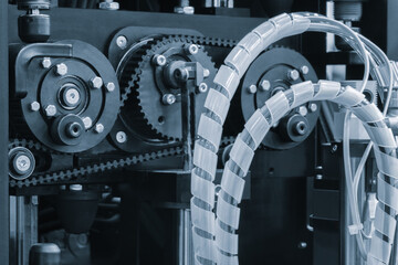 Poster - Machine with chain, gears and electric wires, industrial concept background