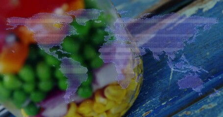 Poster - Colorful vegetables with world map animation overlay on blue wooden surface