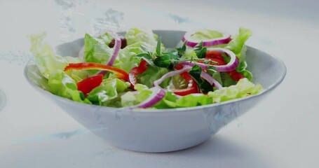 Poster - In white bowl, fresh salad with lettuce, red onions, and peppers