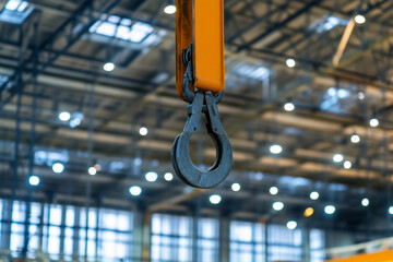 Poster - Modern warehouse interior featuring a crane hook suspended Generative AI