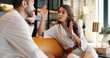 © peopleimages.com - Couple, talk and arguing with fight at house for disagreement, conflict and divorce discussion. Woman, explain and bored man for conversation, toxic relationship and drama and marriage fail in lounge