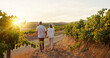 © CC/peopleimages.com - Love, walking and holding hands with old couple in vineyard for romance, anniversary date and bonding. Sunset, retirement and support with senior man and woman at winery for space, back and vacation