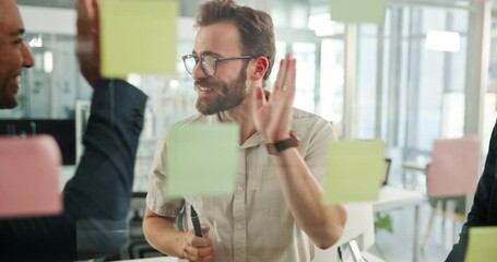 Poster - Businessman, high five and planning by glass with team, excited and happy for problem solving at startup. People, leader and goals with success, support and sticky notes with solution at office