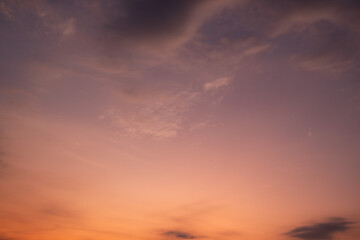 Wall Mural - panoramic view of sunset golden and blue sky nature background. colorful dramatic sky with cloud at 